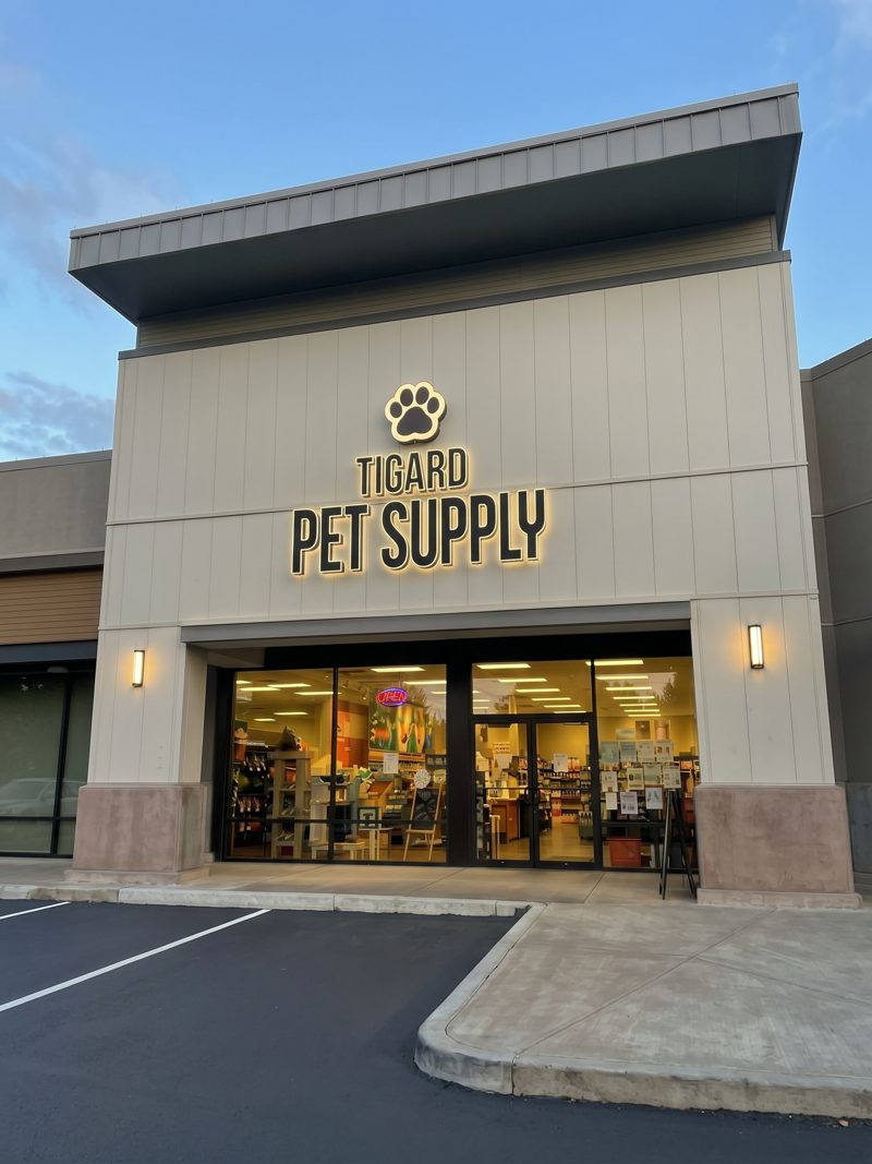 The Tigard Pet Supply storefront with the paw logo over the doors